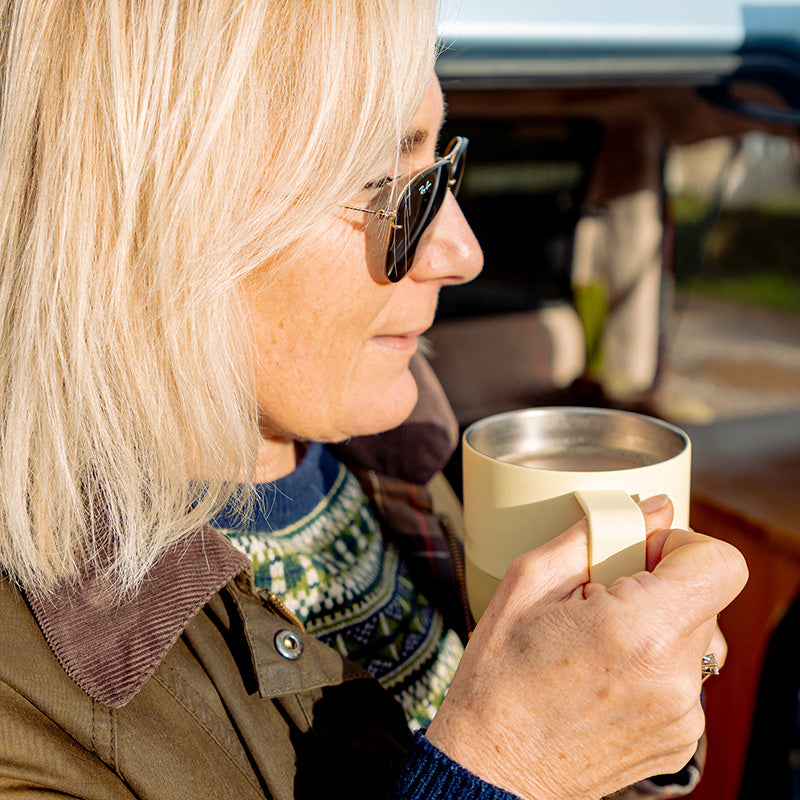 12oz-rise-mug-i6 12oz_rise_coffee_mug_wax_yellow_woman_drink_closeup_square.jpg
