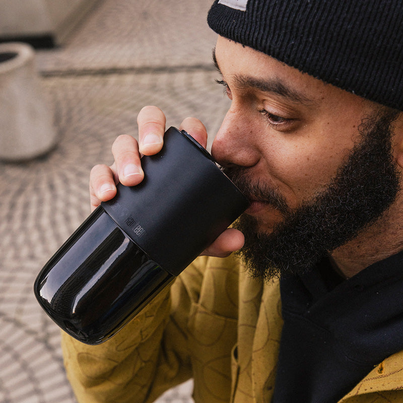 16oz-rise-tumbler-y8 16oz_rise_tumbler_black_man_drink_square.jpg