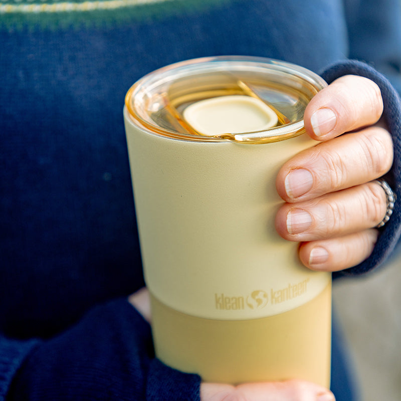 16oz-rise-tumbler-y8 16oz_rise_tumbler_wax_yellow_closeup_hand_lid_square.jpg