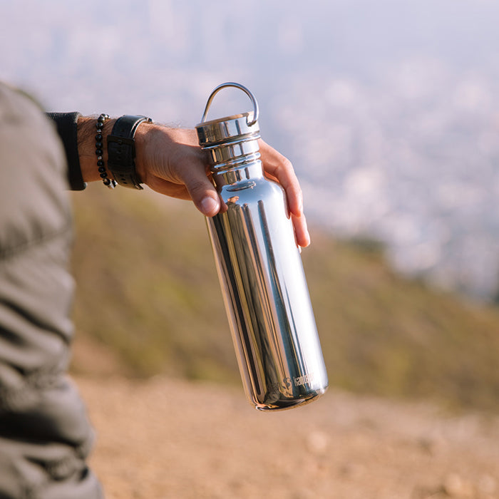 27oz-reflect-with-bamboo-cap-k5 K27SSLRF-MS-BAMBOO_reflect_bottle_hand_lifestyle.jpg