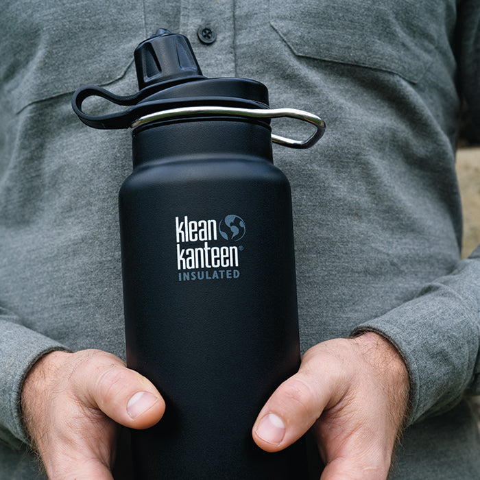 tkwide-chug-cap-j0 K32TKWSSL-SB-Craddled-Bottle_closeup_lifestyle.jpg