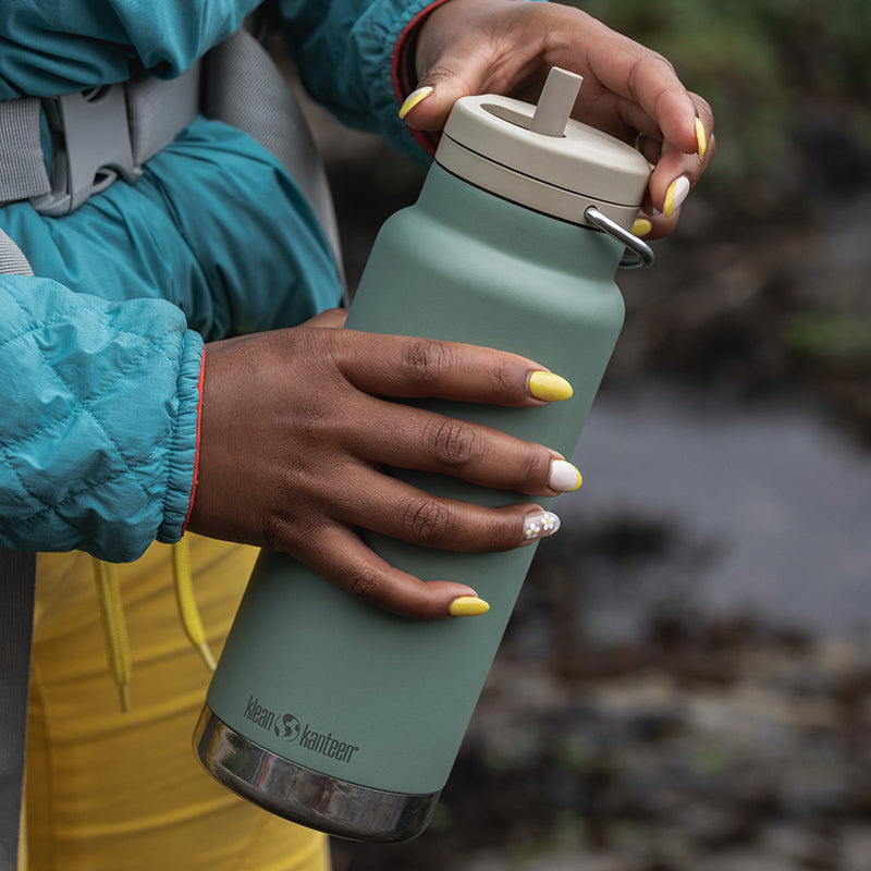 32oz-tkwide-made-to-do-more-bundle-p7 tkwide_32oz_insulated_bottle_twist_closeup_seapsray_hand_square.jpg