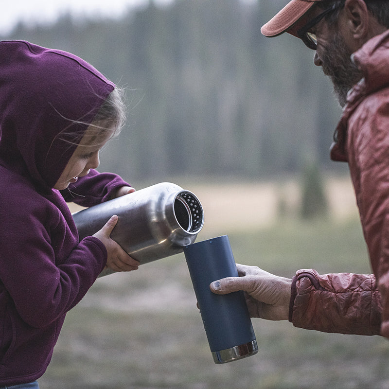 64oz-tkwide-with-loop-cap-i2 tkwide_64oz_bottle_girl_dad_filling_square.jpg